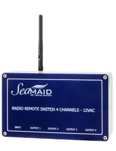 1-4 Channel Radio Control Switch Boxes Rectangular SeaMAID radio remote switch box with upright antenna, blue front panel displaying SeaMAID LED Lighting Solutions, RADIO REMOTE SWITCH 4 CHANNELS - 12VAC, INPUT OUTPUT 1 OUTPUT 2 OUTPUT 3 OUTPUT 4, on white background.