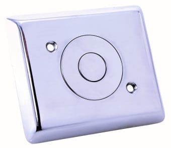 17320 NEW Rectangular chrome wall plate with a recessed central circular push button, two mounting screw holes flanking the button, photographed isolated against a white background.