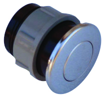 Chrome on plastic ABS Pneumatic Button A chrome push-button drain plug rests on a white background, round polished cap with concentric circle and visible black rubber gasket on gray threaded plastic housing.