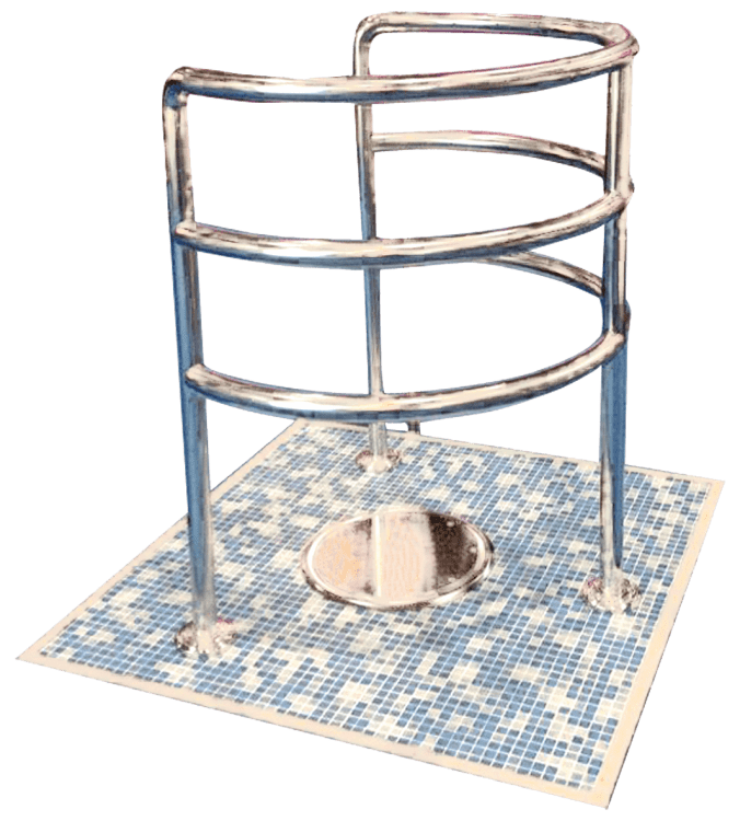 Hydro Station & Hydro Plate A chrome three tier handrail encircles a recessed stainless squat pan mounted on a square of small blue and white mosaic tiles, suggesting an accessible bathroom fixture.