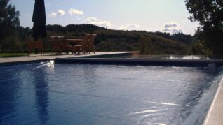Navy Blue AQM Pool Cover Swimming pool with blue cover