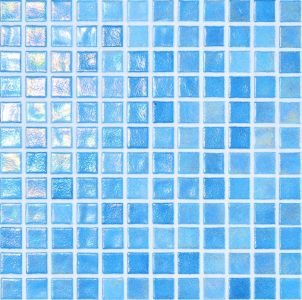 A grid of small square iridescent blue mosaic tiles reflects light, arranged in white-grouted rows and columns forming a glossy wall or pool surface.