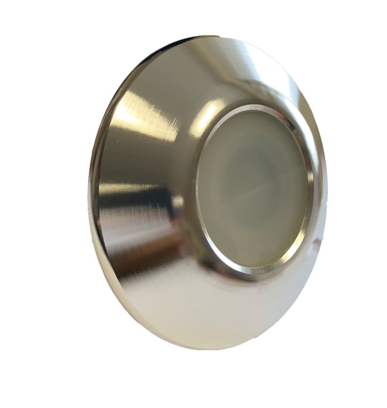 Watertec-WT5-Light-front-on Circular brushed metal recessed LED light sits angled, its frosted central diffuser dimly visible while the shiny rim reflects highlights, shown against a plain white background.