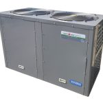 Large gray rectangular heat-pump unit with two axial fans on top sits isolated on a white background; metal panels and side grille visible. Text on unit: "Electro Heat ECO-V Inverter Heat Pumps" and "WATERCO water, the liquid of life".